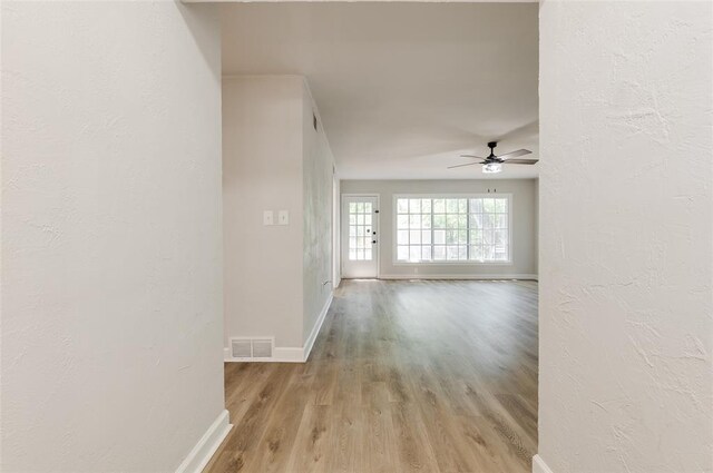 2424 Ashley Dr, The Village, OK 73120 - corridor with light wood-style floors and baseboards