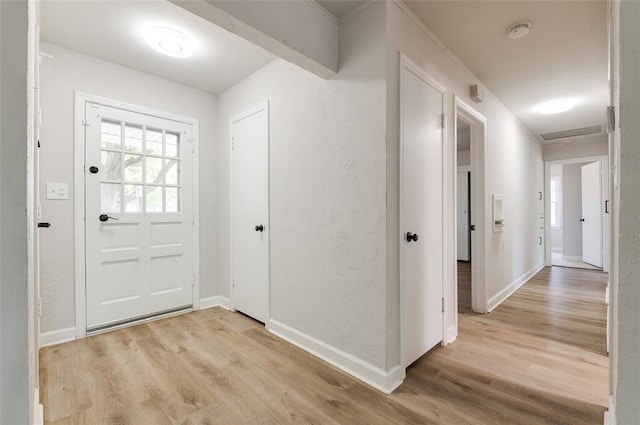 2424 Ashley Dr, The Village, OK 73120 - foyer entrance with light wood finished floors and baseboards