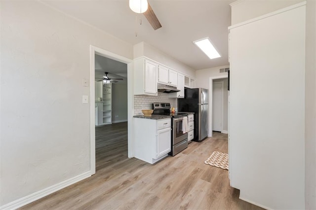 2424 Ashley Dr, The Village, OK 73120 - kitchen featuring stainless steel appliances, ceiling fan, under cabinet range hood, and tasteful backsplash