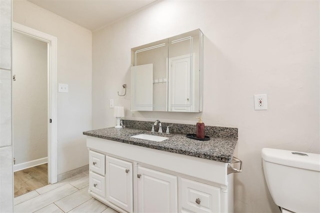 2424 Ashley Dr, The Village, OK 73120 - bathroom featuring vanity and toilet