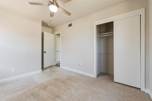 2424 Ashley Dr, The Village, OK 73120 - unfurnished bedroom featuring carpet flooring, baseboards, a closet, and ceiling fan