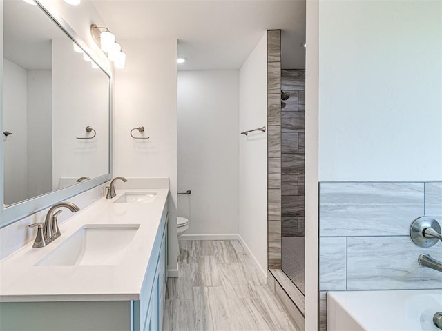 1121 Acacia Creek Dr, Yukon, OK 73099 - full bathroom with a tub, a shower, marble look tiles, and toilet