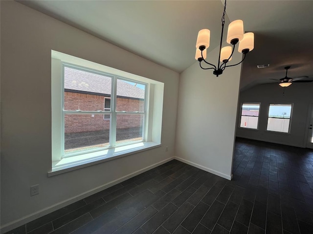 18121 Austin Ct, Edmond, OK 73012 - spare room featuring lofted ceiling, a chandelier, baseboards, ceiling fan, and dark wood-type flooring