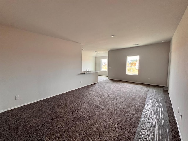 1204 E Stetson Ln, Mustang, OK 73064 - empty room featuring carpet and baseboards