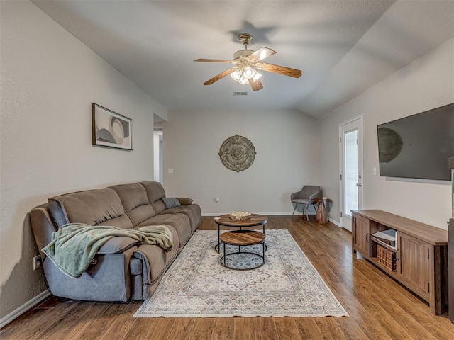2009 Astoria Dr, Moore, OK 73160 - living area featuring ceiling fan, wood finished floors, lofted ceiling, and baseboards
