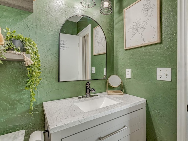 2009 Astoria Dr, Moore, OK 73160 - bathroom with a textured wall and vanity