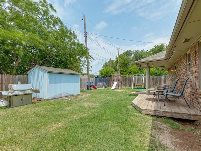 2009 Astoria Dr, Moore, OK 73160 - view of yard with a playground and a deck