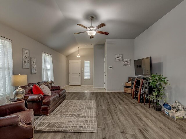 9120 SW 46th St, Oklahoma City, OK 73179 - living room with vaulted ceiling, wood finished floors, ceiling fan, and baseboards