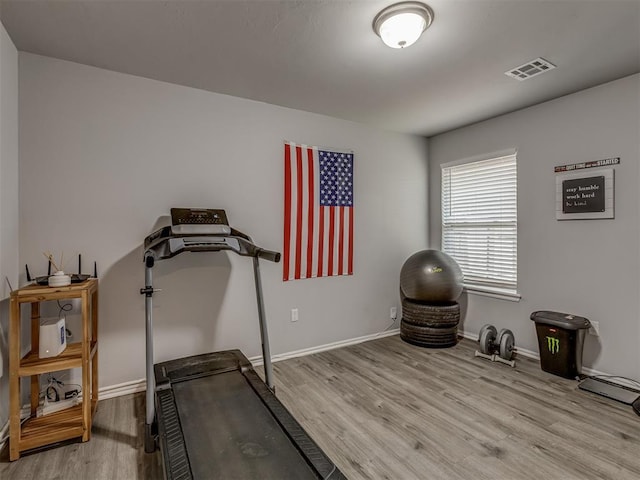9120 SW 46th St, Oklahoma City, OK 73179 - workout room featuring wood finished floors and baseboards