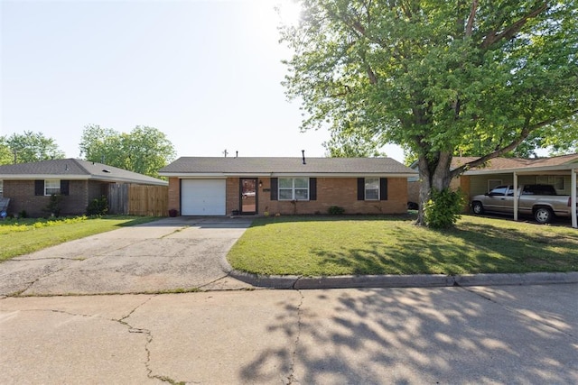 711 Spruce Dr, Yukon, OK 73099 - ranch-style home with an attached garage, concrete driveway, a front lawn, and brick siding