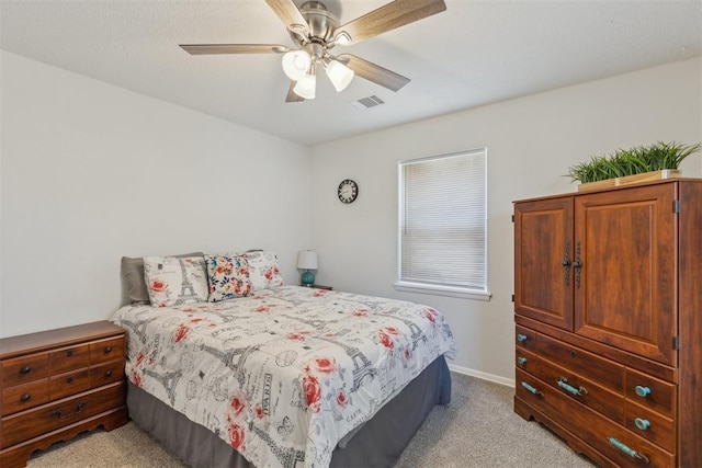 711 Spruce Dr, Yukon, OK 73099 - bedroom featuring carpet flooring, baseboards, and a ceiling fan