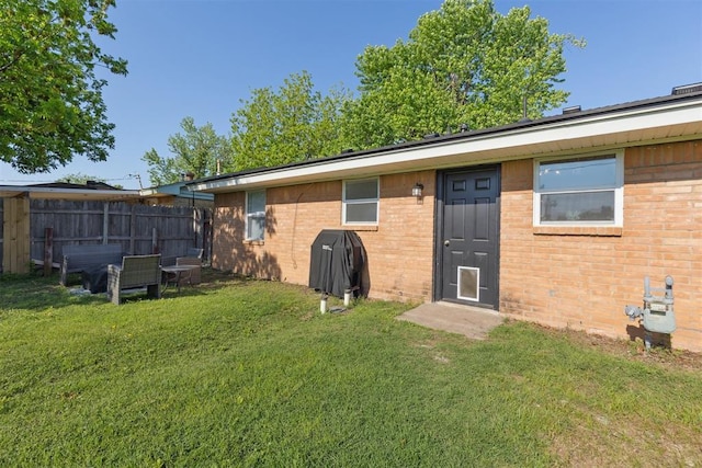 711 Spruce Dr, Yukon, OK 73099 - rear view of house with brick siding