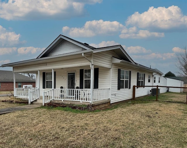view of front of house featuring covered porch and central AC unit