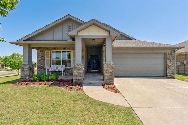 3432 Piney River Dr, Yukon, OK 73099 - craftsman-style home featuring brick siding, covered porch, an attached garage, a front yard, and driveway