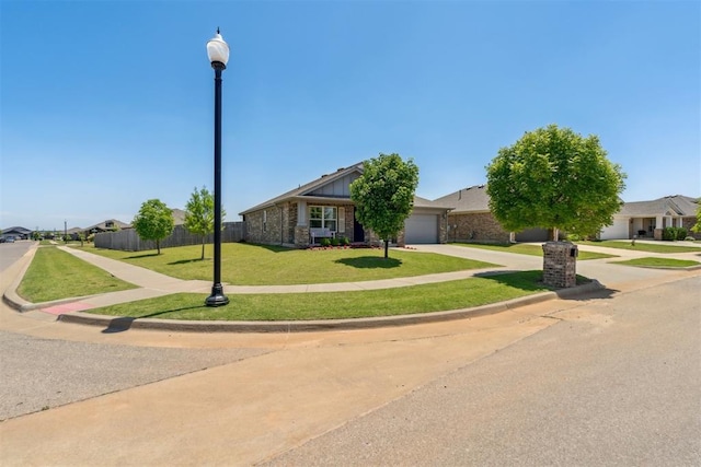 3432 Piney River Dr, Yukon, OK 73099 - view of front of property with concrete driveway, a garage, a residential view, and brick siding