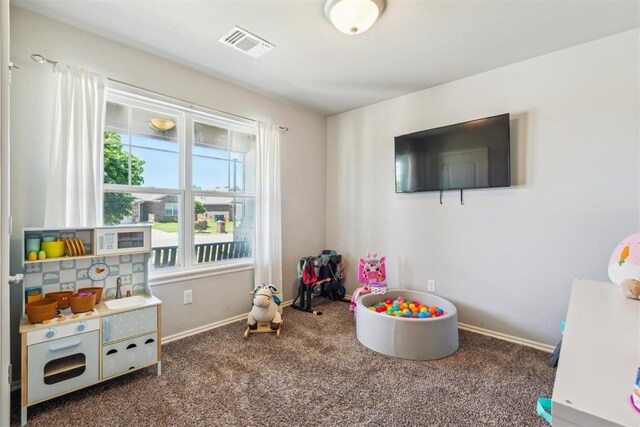 3432 Piney River Dr, Yukon, OK 73099 - playroom featuring carpet floors and baseboards