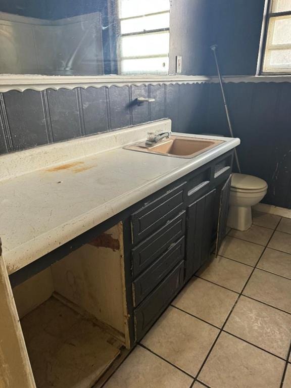 3316 Beechwood Dr, Del City, OK 73115 - bathroom with tile patterned floors, toilet, and vanity