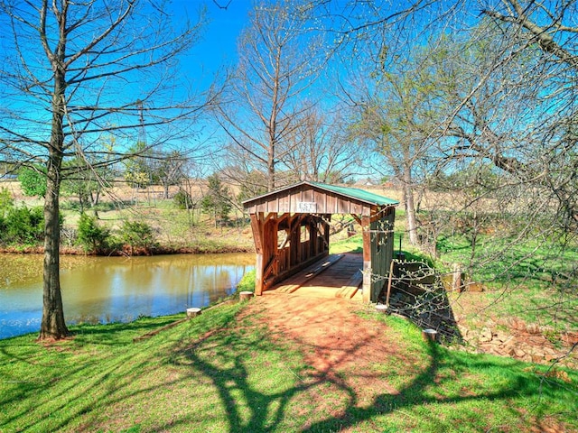 dock area featuring a water view