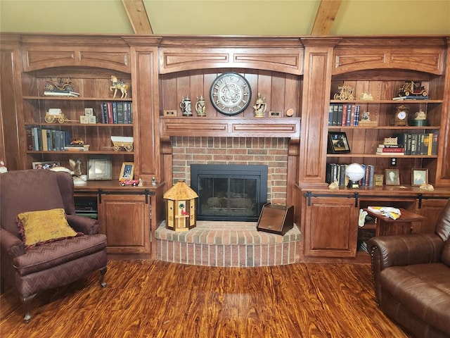 11301 Brockton Pl, Oklahoma City, OK 73162 - living area featuring beam ceiling, a fireplace, and dark wood-style flooring