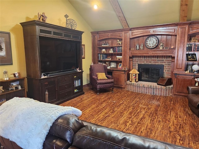 11301 Brockton Pl, Oklahoma City, OK 73162 - living area with wood finished floors, a brick fireplace, and built in shelves