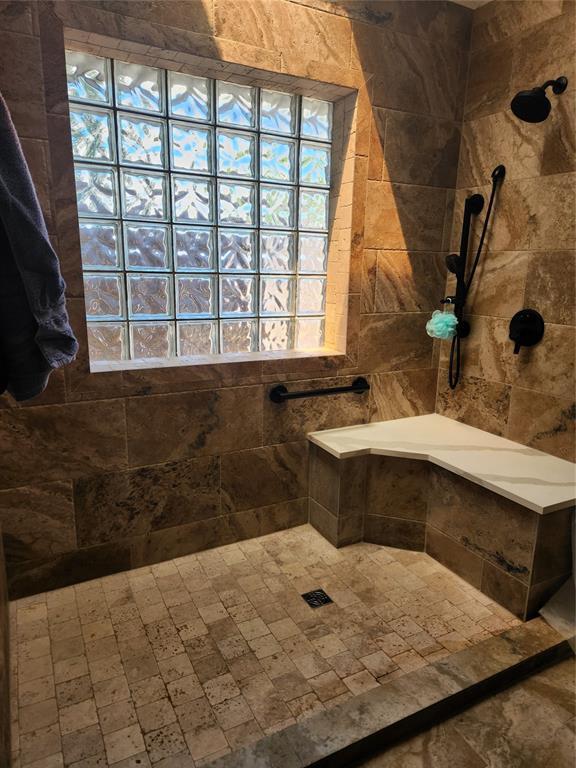 11301 Brockton Pl, Oklahoma City, OK 73162 - full bath with a tile shower and tile walls