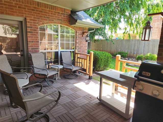 11301 Brockton Pl, Oklahoma City, OK 73162 - view of patio with fence and grilling area