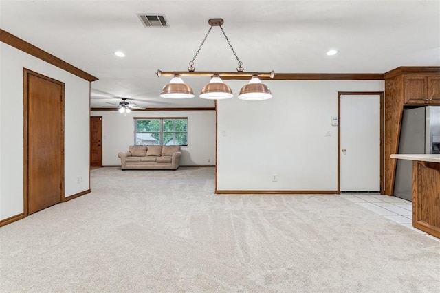 unfurnished living room featuring crown molding, light carpet, baseboards, recessed lighting, and ceiling fan