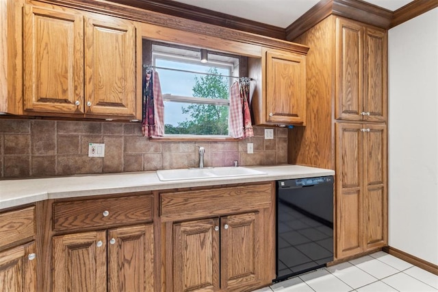 kitchen featuring black dishwasher, a sink, decorative backsplash, brown cabinetry, and ornamental molding