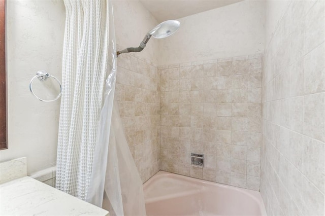 bathroom featuring shower / tub combo with curtain