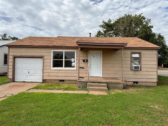1011 E Sutherland St, Altus, OK 73521 - ranch-style home featuring crawl space, concrete driveway, a front lawn, an attached garage, and a shingled roof
