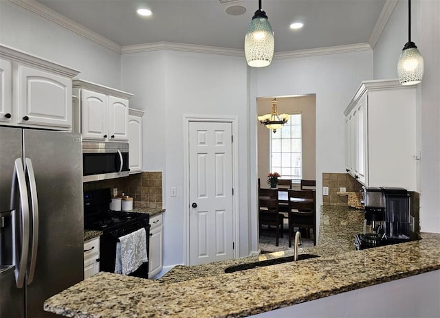 12401 SW 7th St, Yukon, OK 73099 - kitchen featuring appliances with stainless steel finishes, backsplash, stone countertops, crown molding, and white cabinets