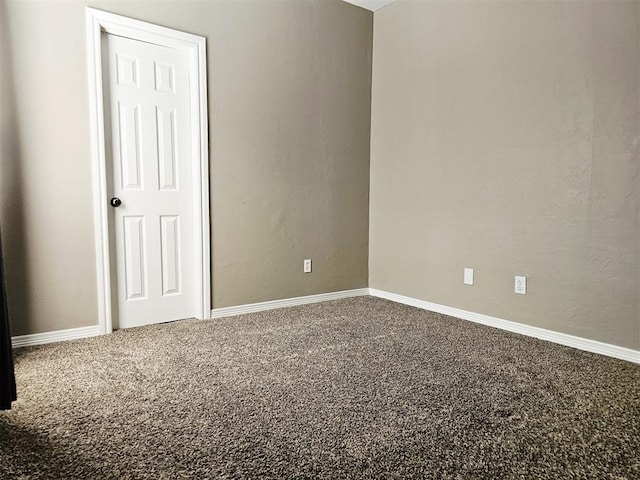 12401 SW 7th St, Yukon, OK 73099 - carpeted spare room with baseboards and a textured wall