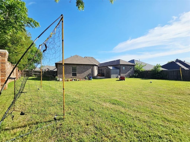 12401 SW 7th St, Yukon, OK 73099 - view of yard with a shed and an outbuilding