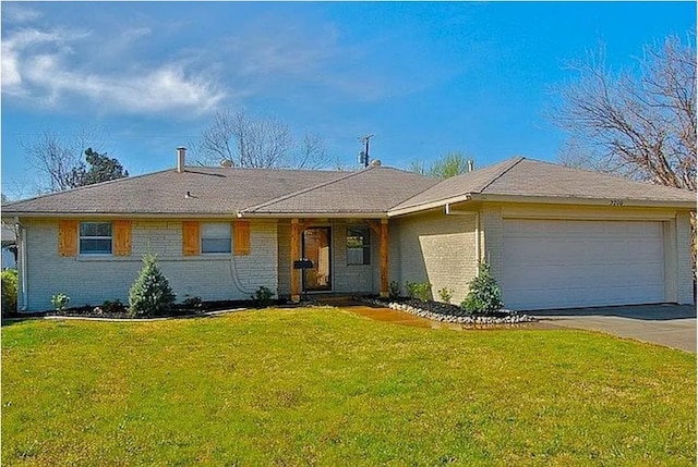 3708 NW 59th St, Oklahoma City, OK 73112 - ranch-style home with an attached garage, brick siding, concrete driveway, and a front yard