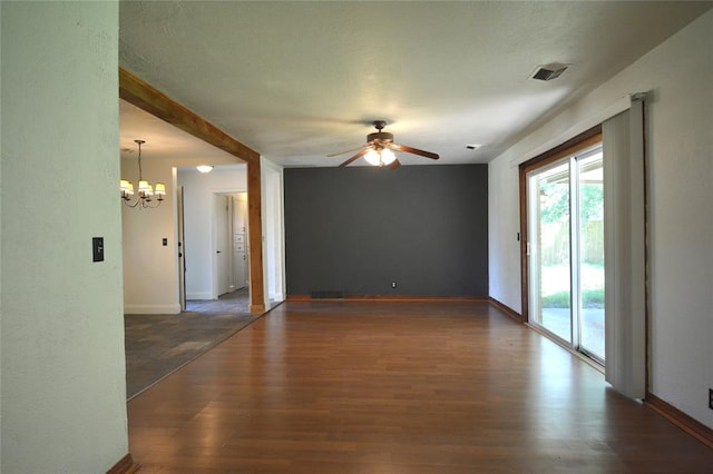 3708 NW 59th St, Oklahoma City, OK 73112 - spare room featuring a chandelier, ceiling fan, wood finished floors, and baseboards