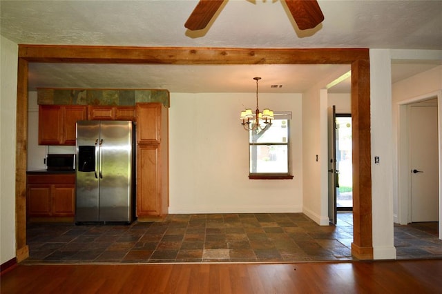 3708 NW 59th St, Oklahoma City, OK 73112 - kitchen with stainless steel refrigerator with ice dispenser, black microwave, a ceiling fan, brown cabinetry, and a chandelier