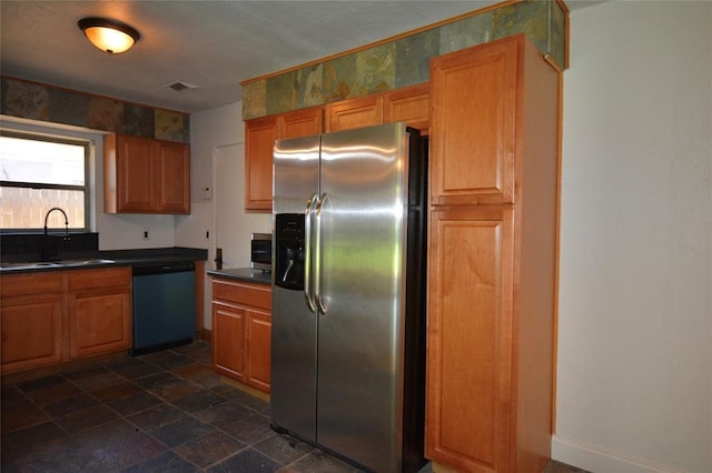 3708 NW 59th St, Oklahoma City, OK 73112 - kitchen with stainless steel fridge with ice dispenser, dishwashing machine, a sink, dark countertops, and dark stone finish flooring