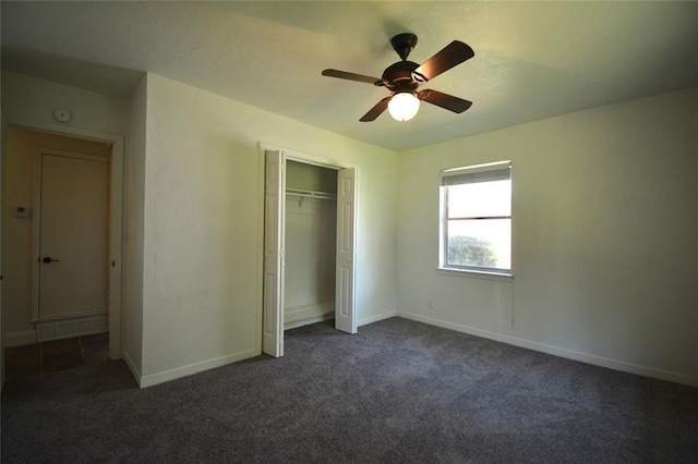 3708 NW 59th St, Oklahoma City, OK 73112 - unfurnished bedroom with dark carpet, baseboards, and a closet