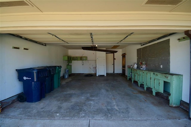 3708 NW 59th St, Oklahoma City, OK 73112 - garage featuring a garage door opener
