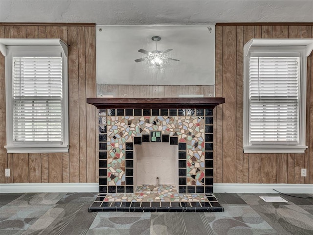 2617 NW 23rd St, Oklahoma City, OK 73107 - detailed view of ceiling fan, baseboards, and wood walls