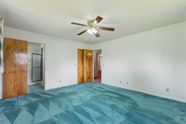 1009 Cherokee Pl, Lindsay, OK 73052 - unfurnished bedroom featuring carpet, baseboards, ceiling fan, and ensuite bath