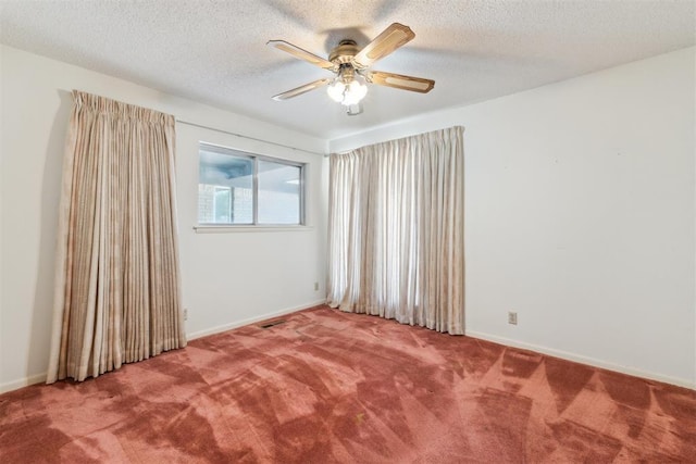 1009 Cherokee Pl, Lindsay, OK 73052 - carpeted spare room featuring a ceiling fan, baseboards, and a textured ceiling