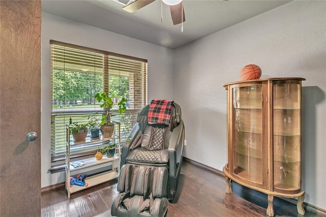 8701 Long Spur Trl, Edmond, OK 73034 - sitting room featuring wood finished floors, a ceiling fan, and baseboards