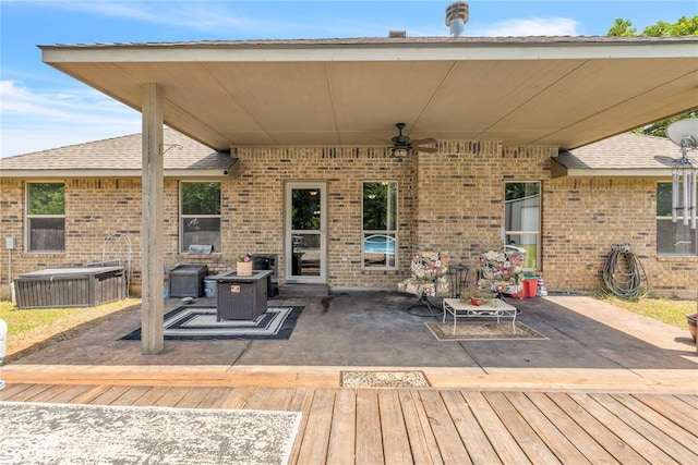 8701 Long Spur Trl, Edmond, OK 73034 - view of patio / terrace with a deck and a ceiling fan