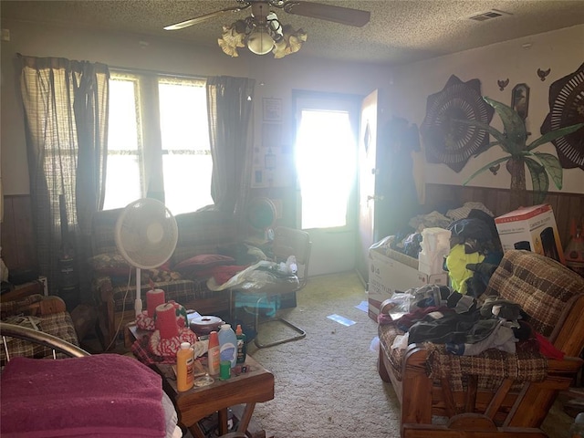 811 N Admire Ave, El Reno, OK 73036 - living area featuring carpet, ceiling fan, and a textured ceiling