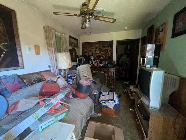 811 N Admire Ave, El Reno, OK 73036 - living room with a ceiling fan, a textured ceiling, and carpet floors