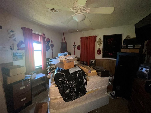 811 N Admire Ave, El Reno, OK 73036 - bedroom featuring a ceiling fan and a textured ceiling