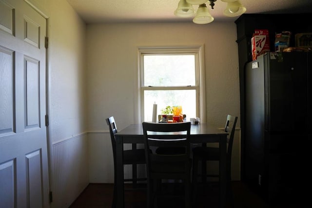 4753 SE 17th St, Oklahoma City, OK 73115 - dining area featuring a chandelier