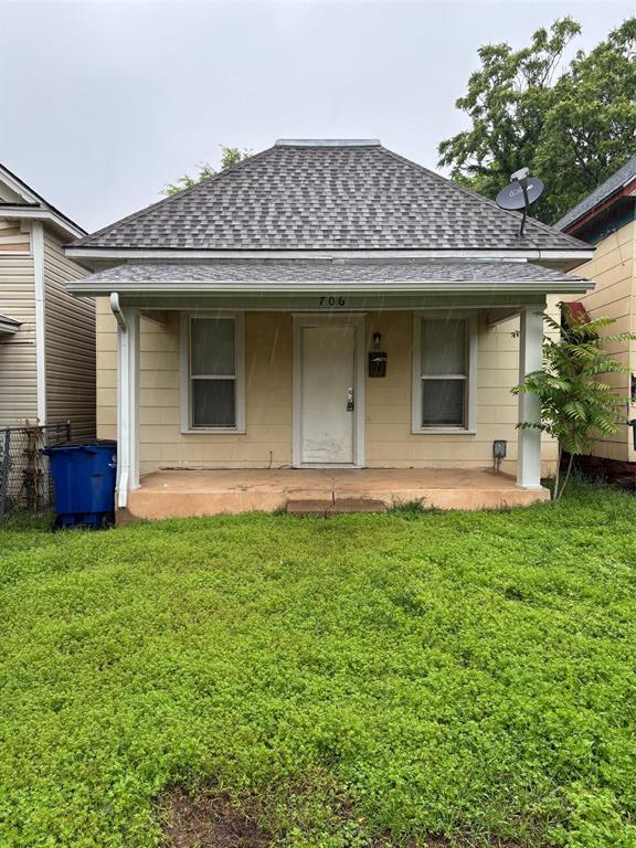 706 E Harrison Ave, Guthrie, OK 73044 - back of house featuring roof with shingles