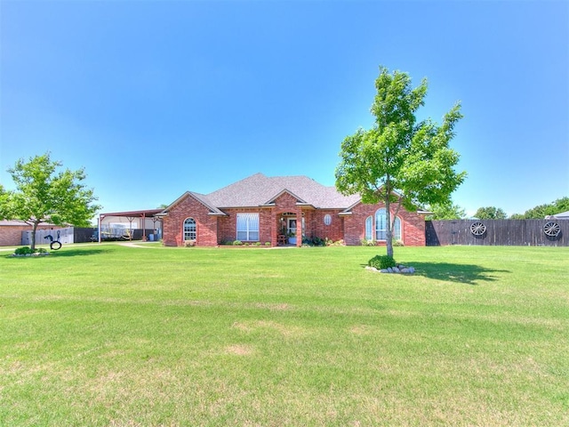 9315 Fendrych Dr, Oklahoma City, OK 73165 - single story home featuring brick siding and a carport